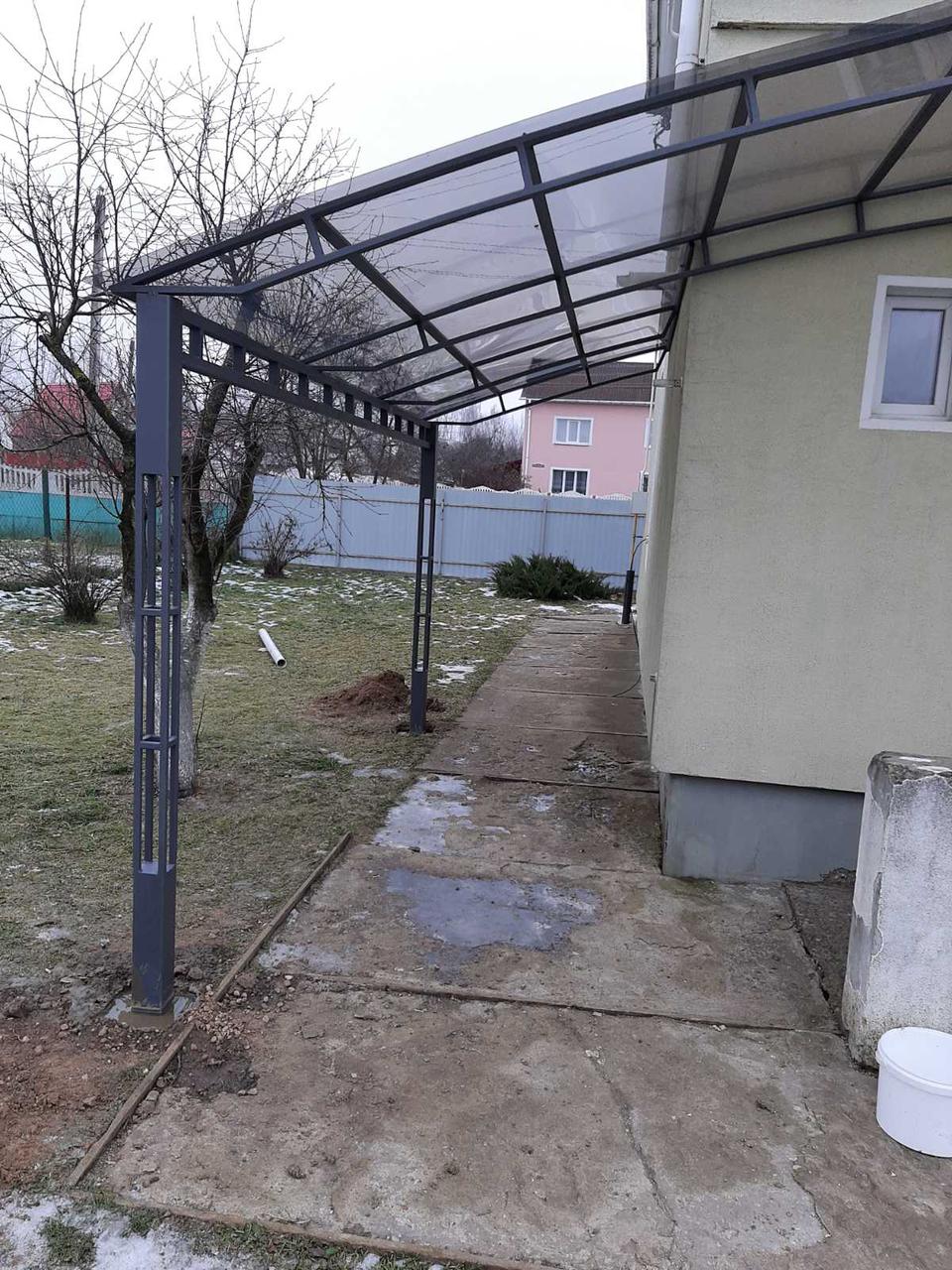 Навесы от производителя из поликарбоната 8 мм либо монолитного поликарбоната.ООО «Саниджи» изготовит навесы, козырьки, заборы, ворота, перила и многое другое. Звоните нам  и мы воплотим ваши идеи. Навес кованый НК-51 НАВЕСЫ Изделия для сада ооо саниджи S03-676 120 Br